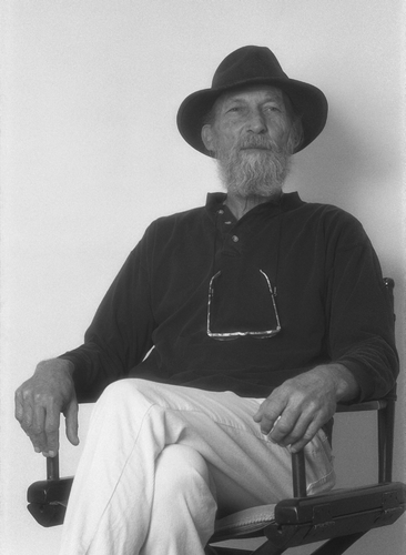 Evan Blythin with sculptures in the background